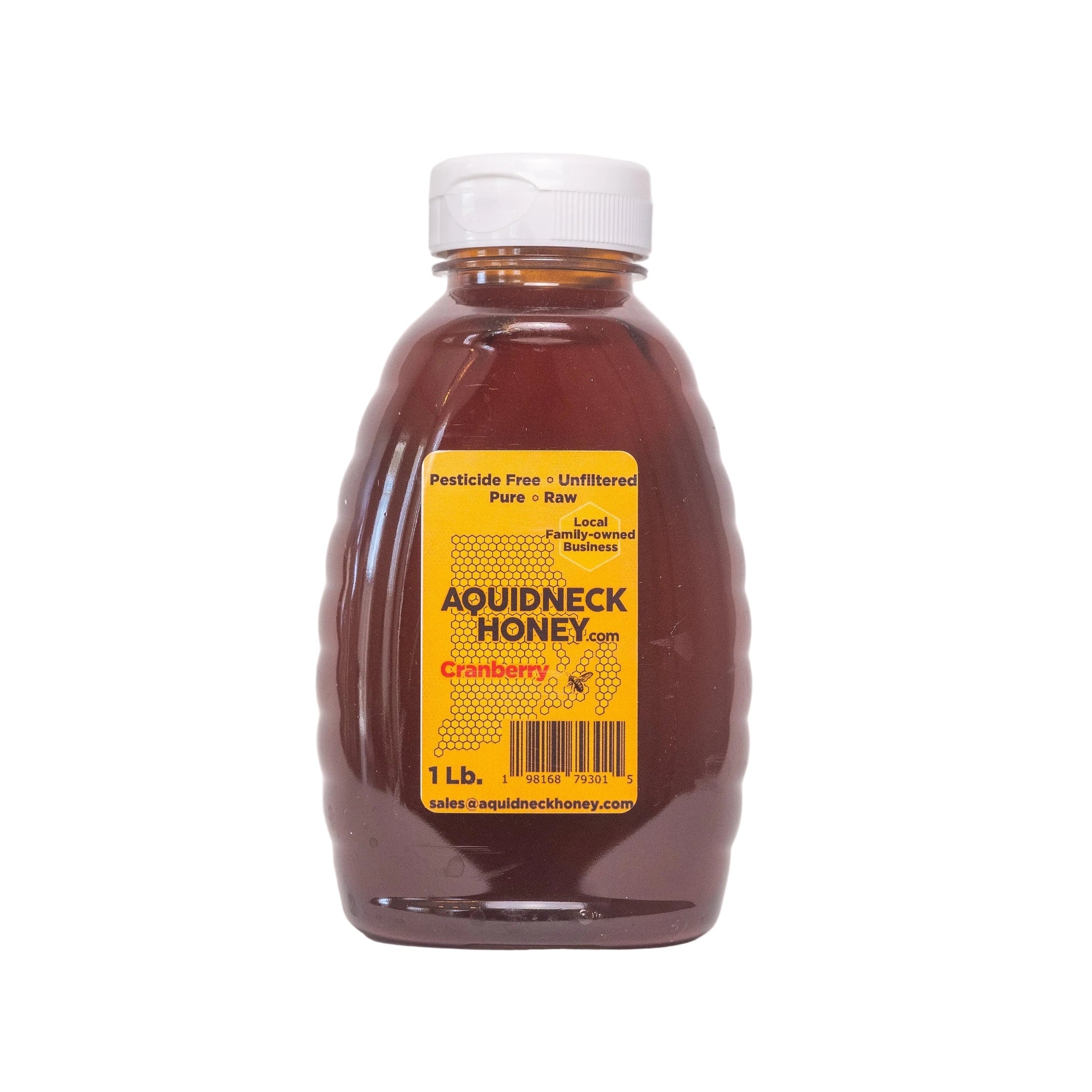 Bottle of Aquidneck Honey with a yellow label on a white background