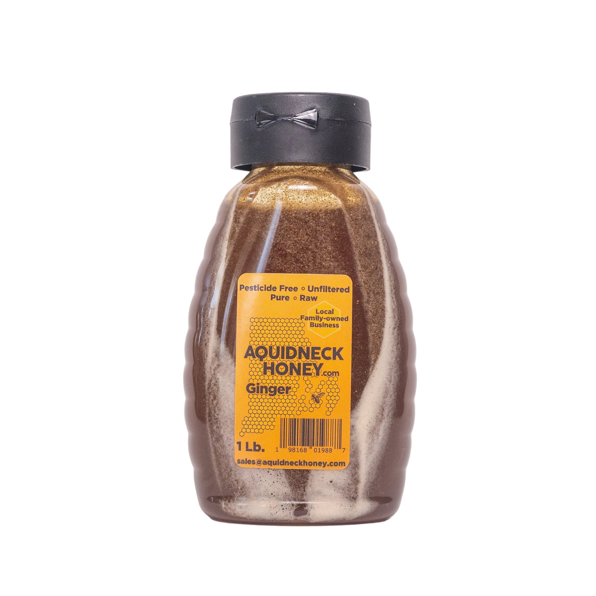 Bottle of Aquidneck Honey ginger honey on a light gray background