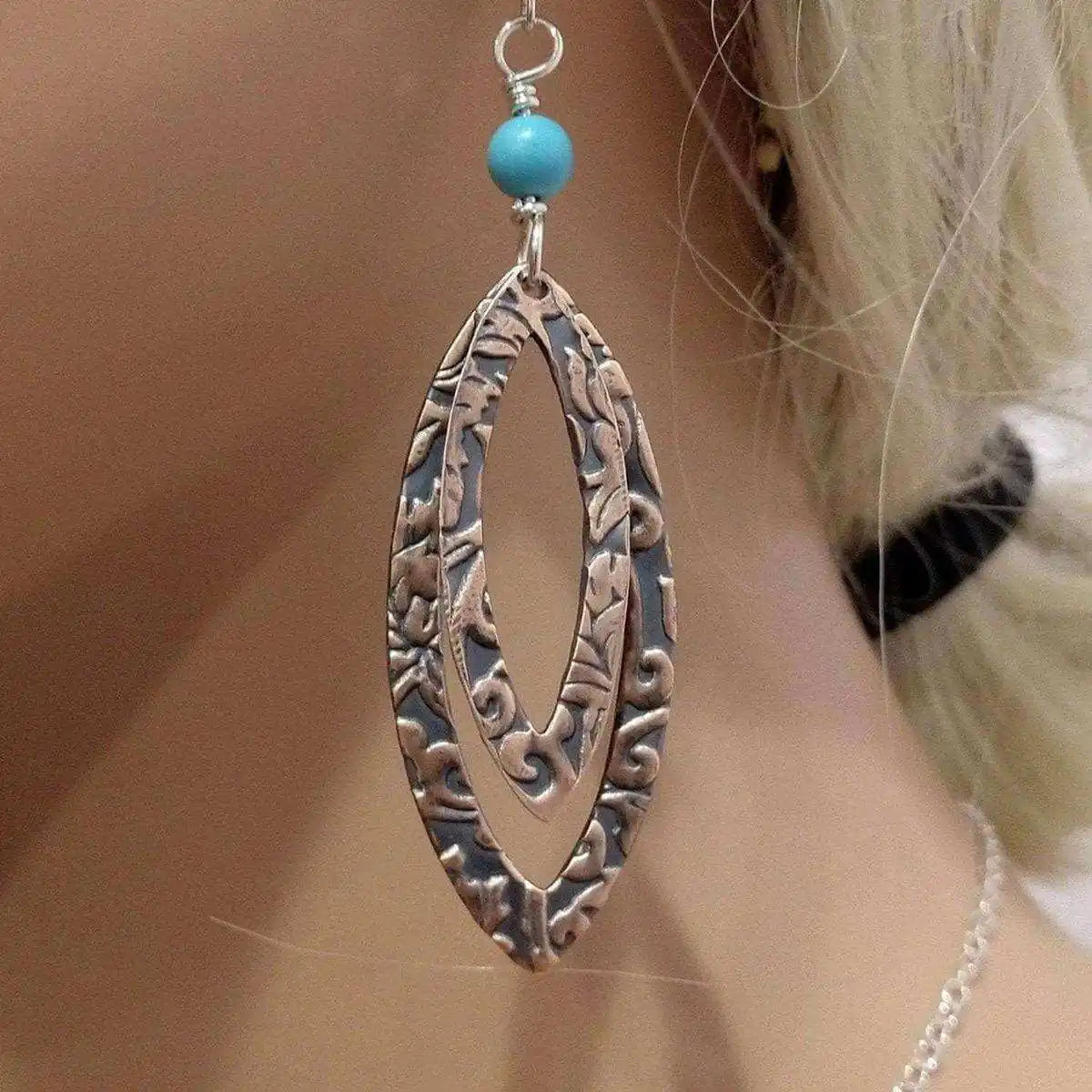 Copper Embossed Pointed Oval Turquoise Bead Earrings