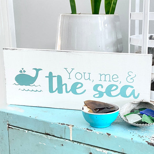 You, me, and the sea sign