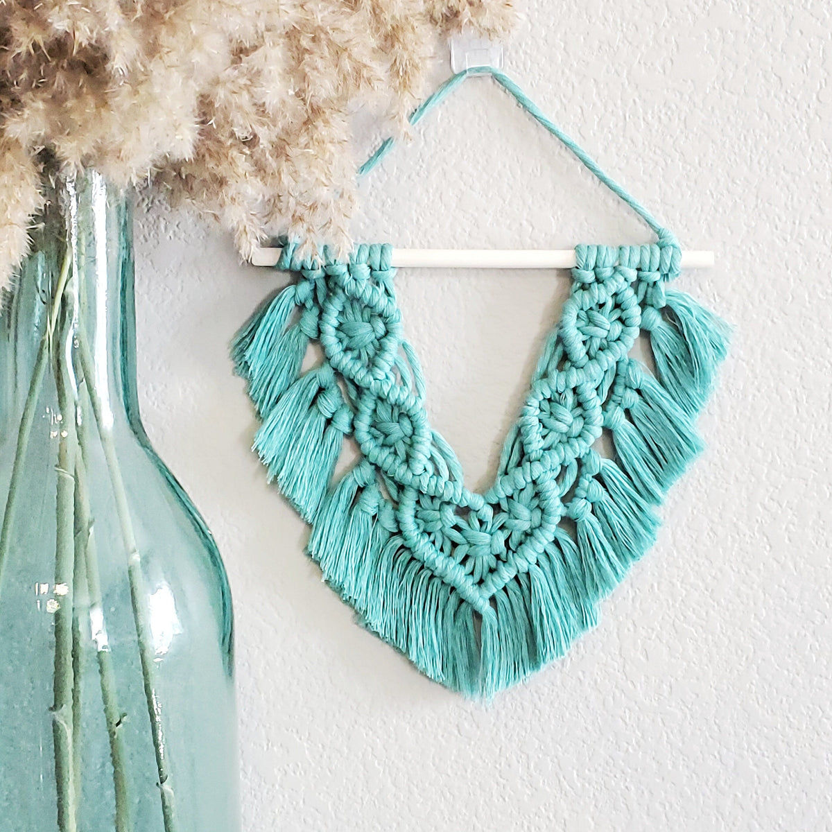 Beginner macrame wall hanging DIY craft kit.