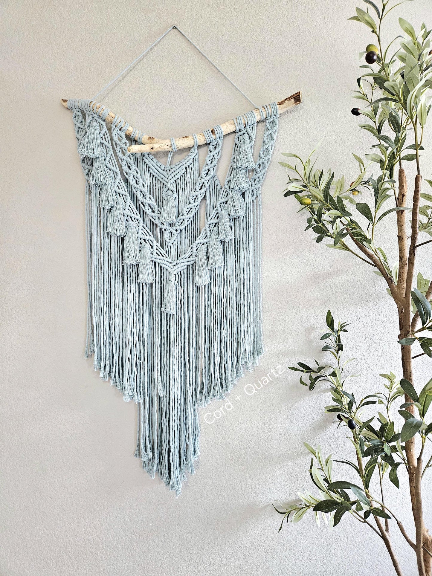 Clearance eggshell Blue macrame wall hanging.